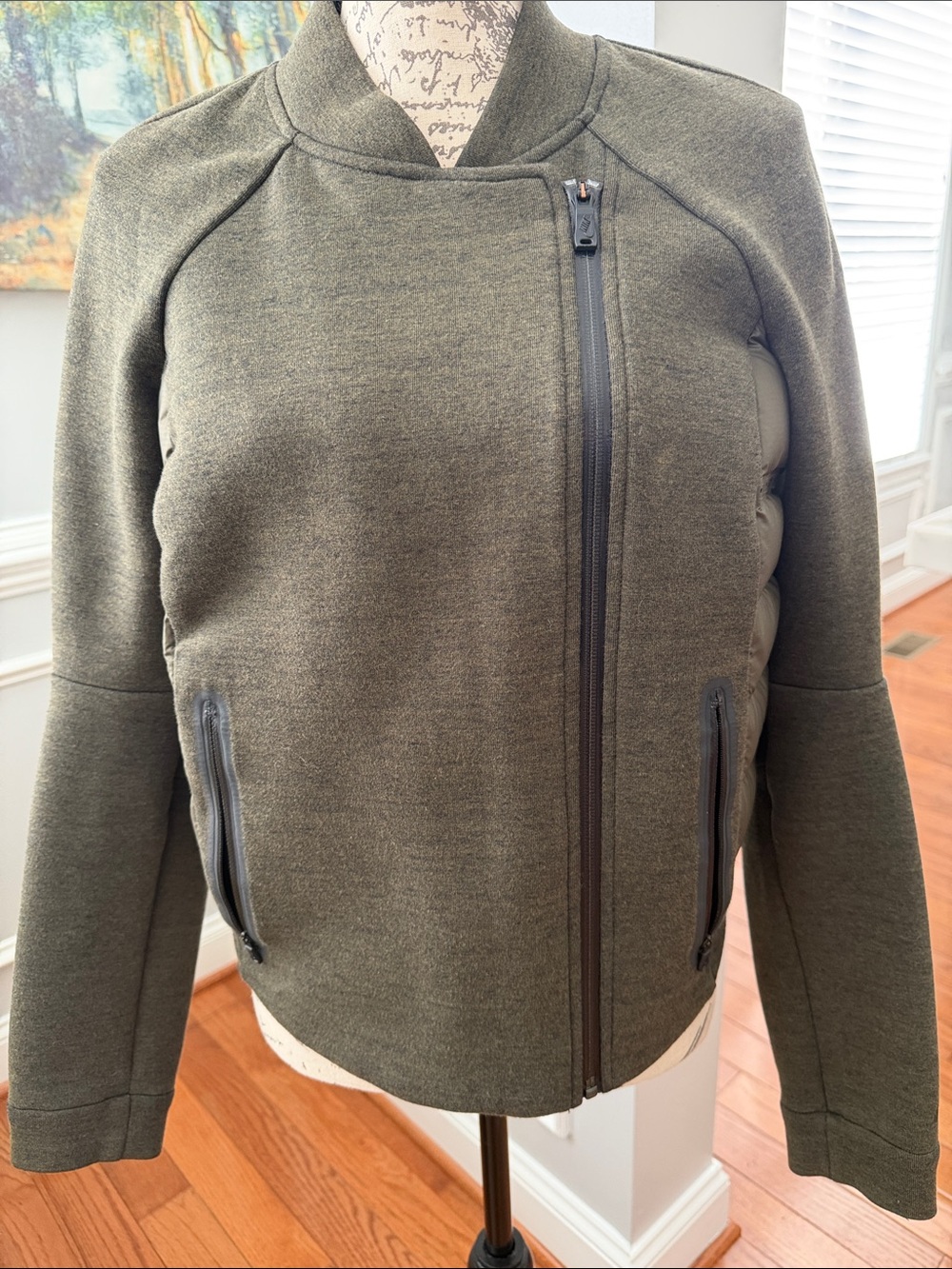 Nike Aeroloft Tech Fleece Moto Jacket features an asymmetrical zipper